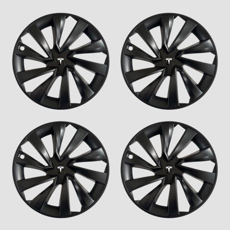 Vier zwarte MV Spiral wieldoppen met Tesla-logo voor Model Y 2025.