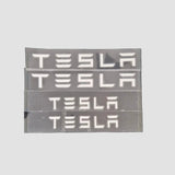 Letters "TESLA"