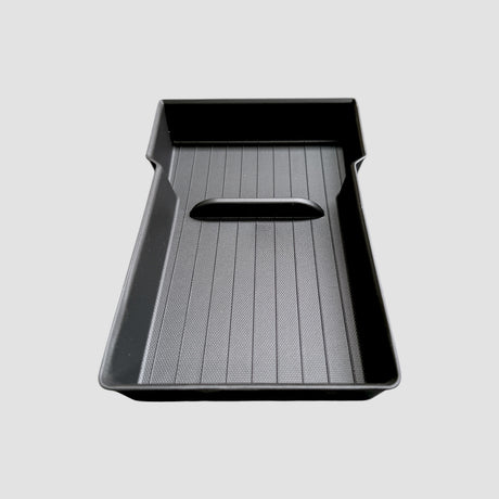 Zwarte opbergdoos voor armleuning, ontworpen voor Tesla Model Y Juniper, getoond op een grijze achtergrond.
